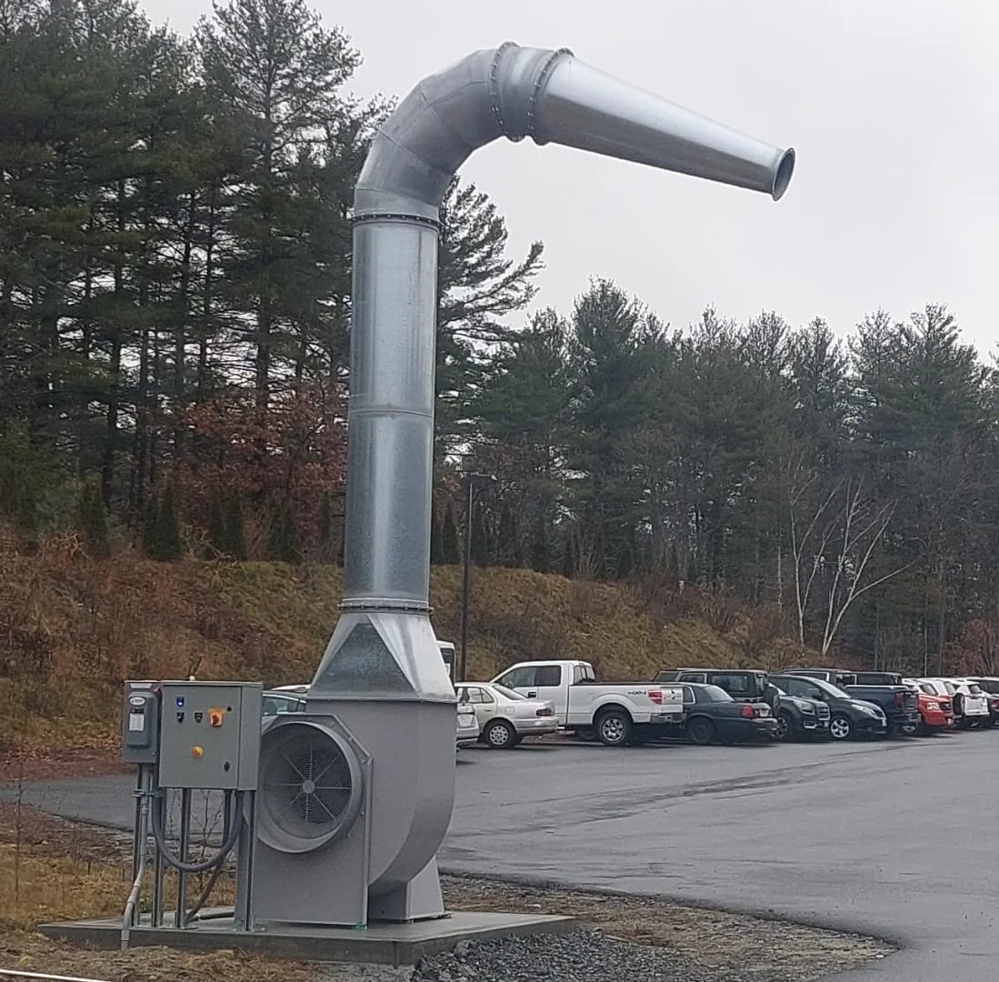 Fleet Blast stationary air-blast snow removal system with blower housing and overhead discharge duct